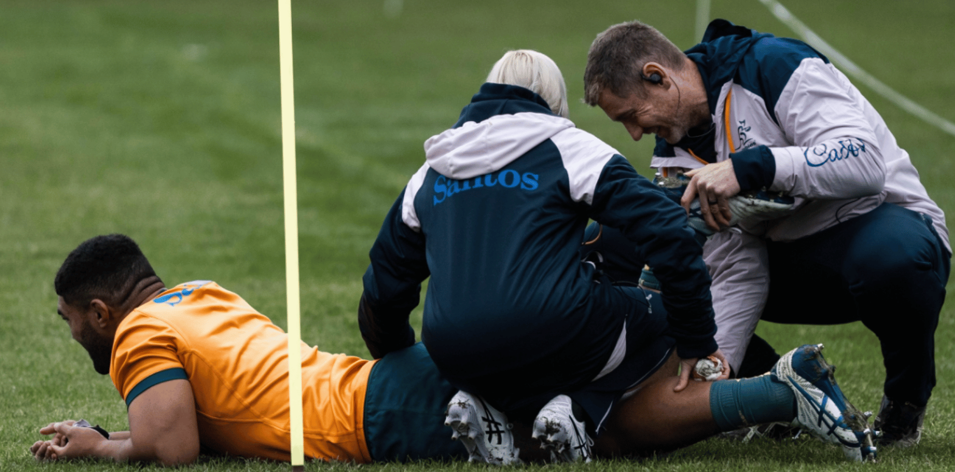 Dave O’Sullivan treating a pro sports player when he was the Wallabies Physiotherapist at The 2023 Rugby World Cup